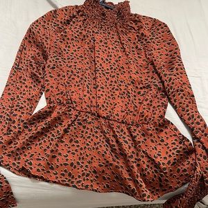 This shirt is from boohoo size medium very classy and cute